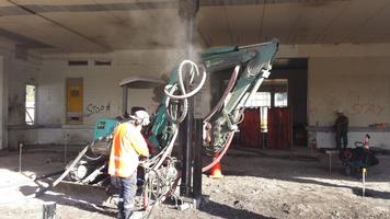 Drilling And Installing Micropiles With Permanent Casing Inside Existing Building